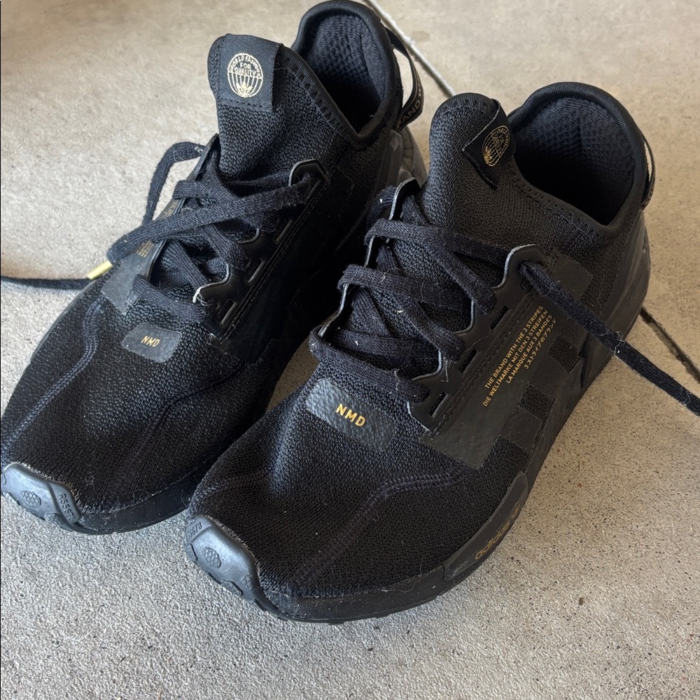 Adidas Black NMD Sneakers with Gold Details